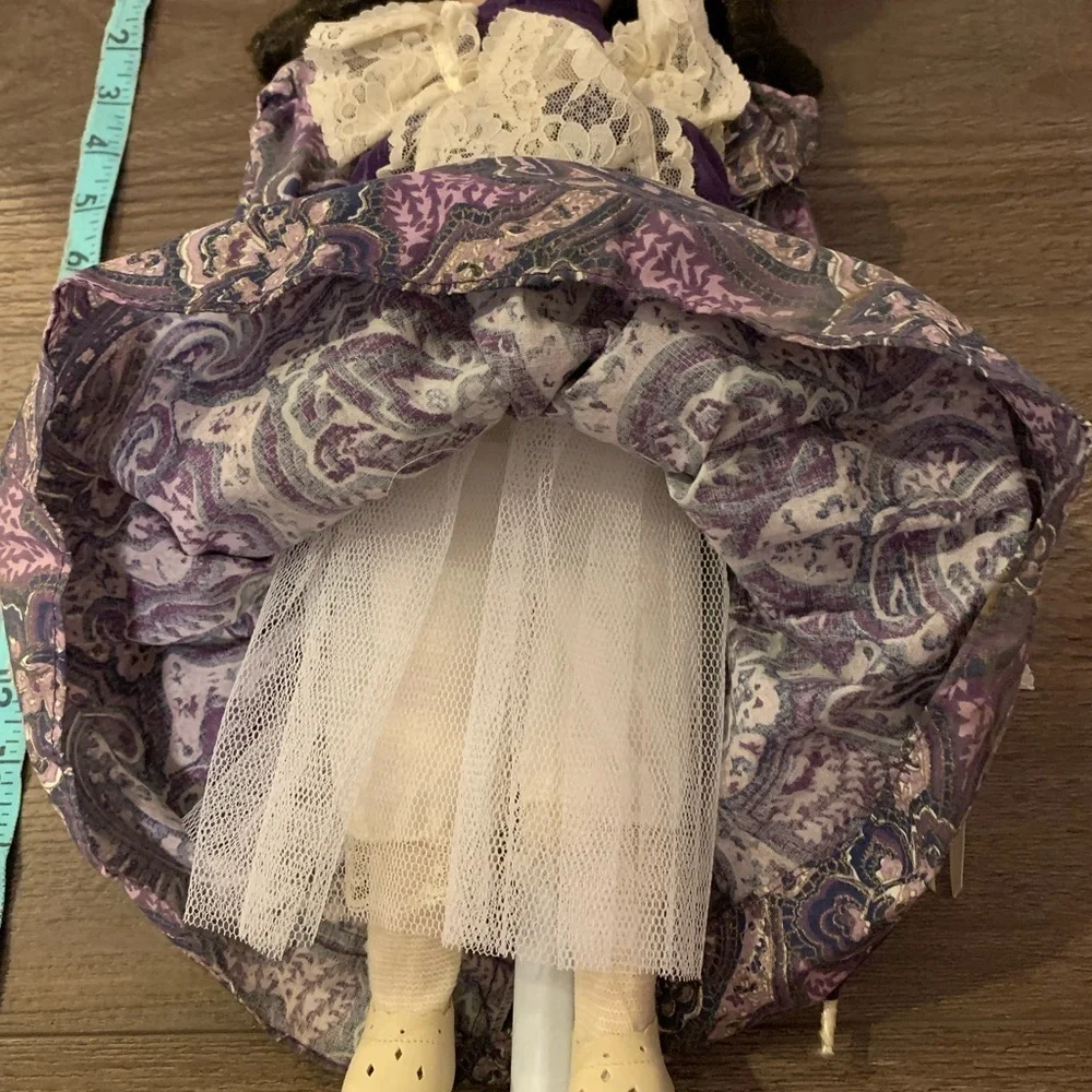 Elegant Purple and Cream Doll